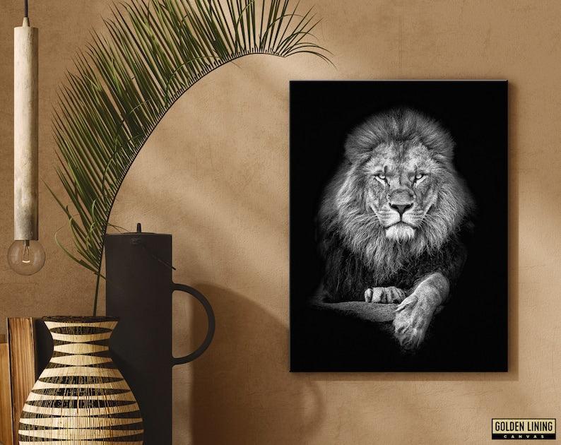 Lion portrait canvas in black and white on a terracotta wall with a palm leaf and boho vases