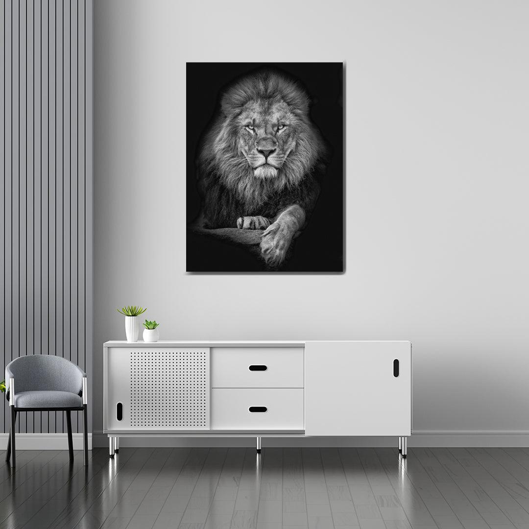 Lion portrait canvas in grayscale above a white sideboard with small succulents in a scandi interior
